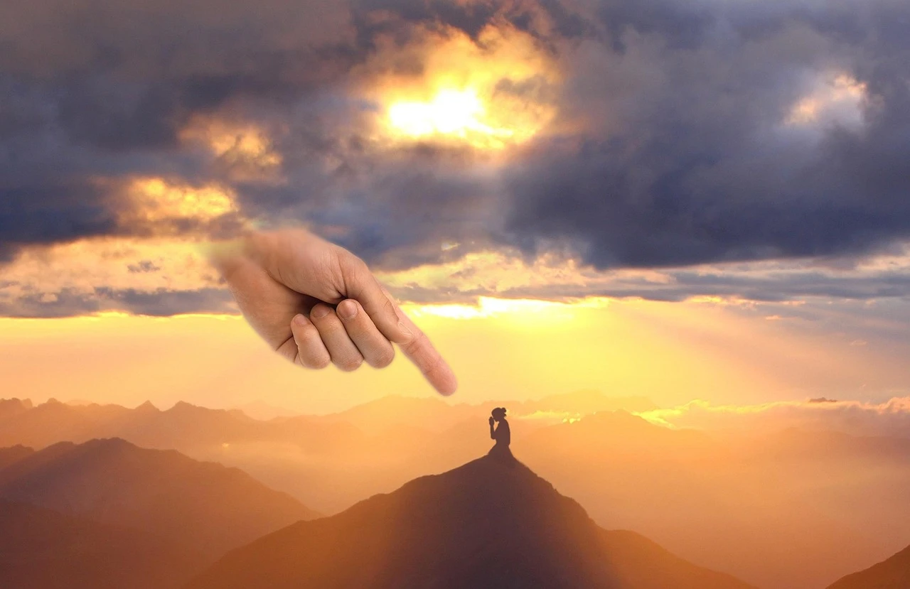 Sunrise over mountain clouds, evoking the majesty and nearness of God